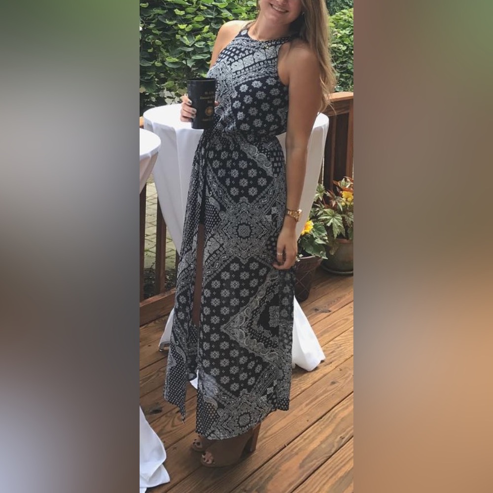 Blue romper dress with white pattern
